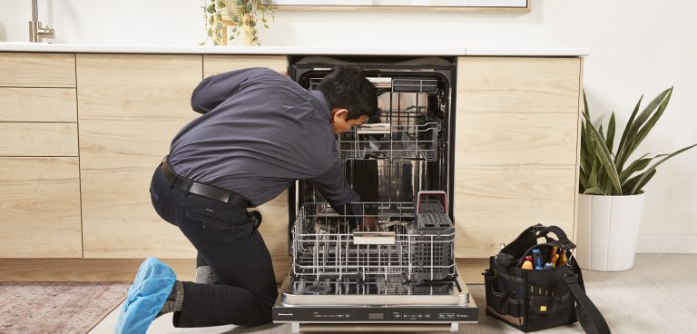 Technician Checking Inside The Dishwasher To Find Reasons Why The Dishwasher Is Not Starting