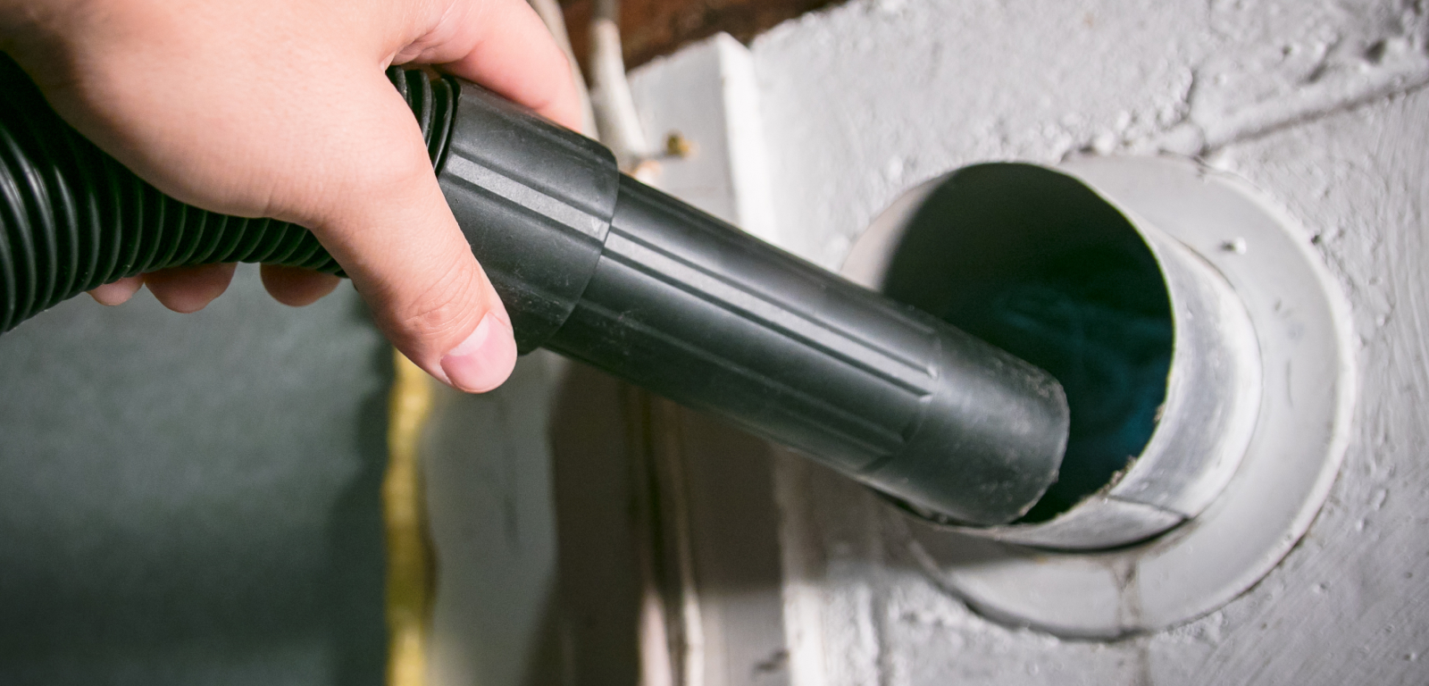 Someone vacuums the dryer vent hole.