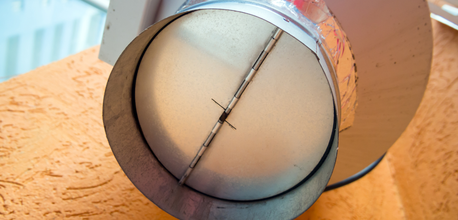 A part for a kitchen range hood