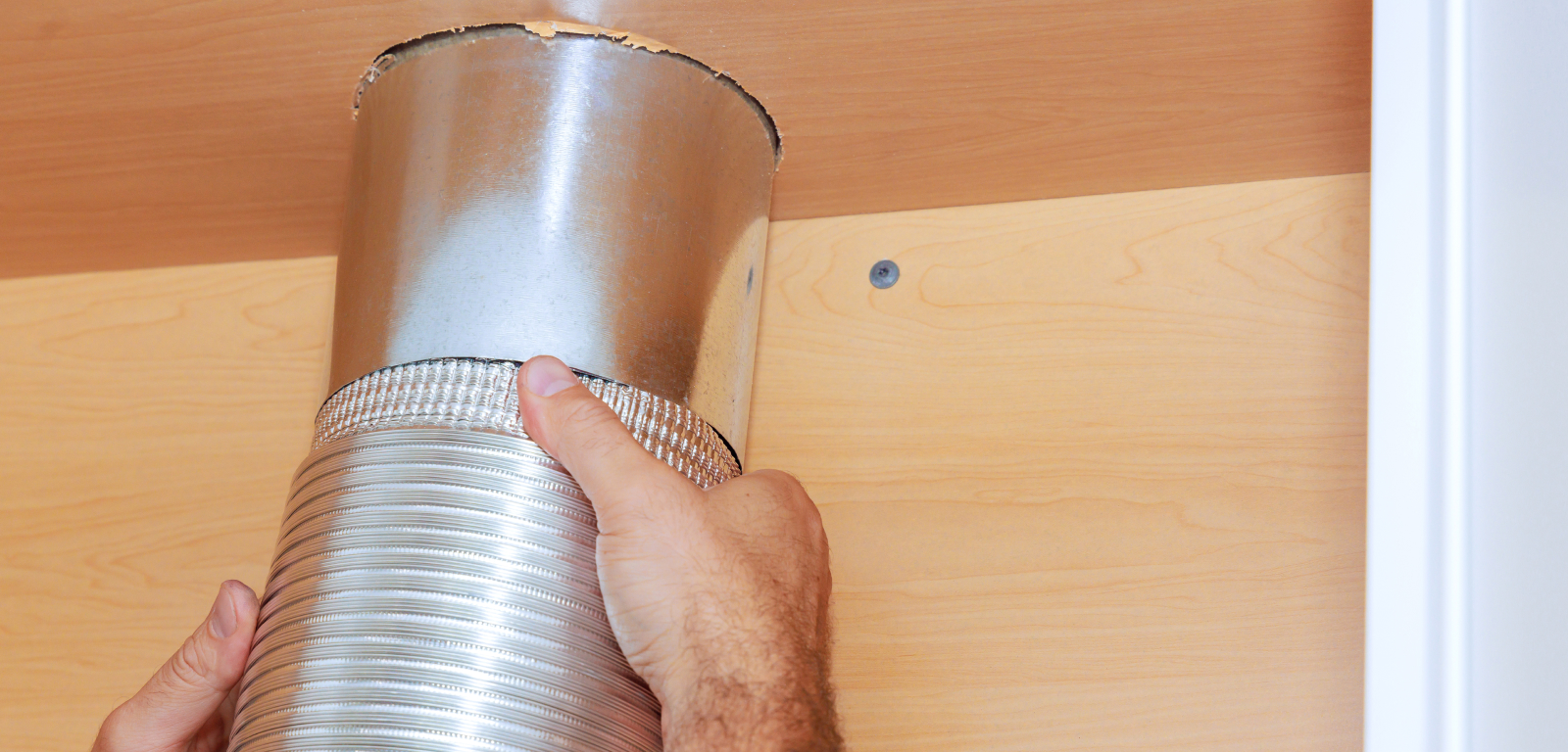 Someone holds a vent.